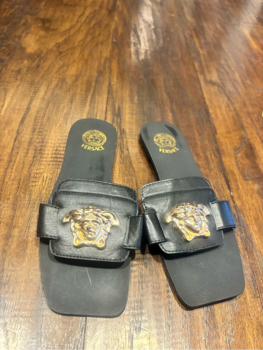 Versace Black Leather Slides with Gold Medusa Plaque